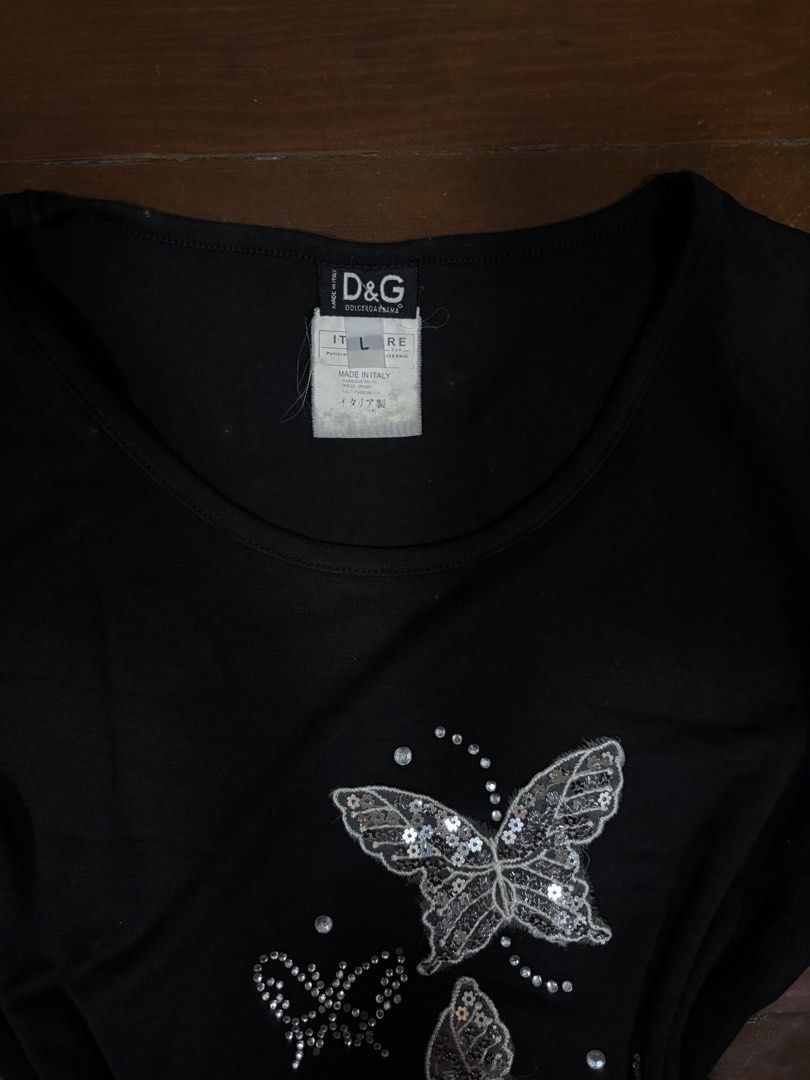 Dolce & Gabbana Butterfly Rhinestone Beaded Top (Category: Shirts) located in Manila. Submitted by da.rrel.real (Listing ID 1464691941, Image 2). Description: ⋆˚꩜｡ details ⋆˚꩜｡ size : l on tag best fits : best fits m-l issues : missing rhinestone color rate : 9/10 .✦ ݁˖ rules .✦ ݁˖ * no return / refund / exchange * you ask for more photos if you're SURE BUYER * shipping fee is shouldered by buyers unless stated otherwise (loc: Baguio City) love, 