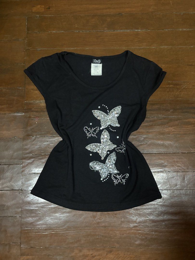 Dolce & Gabbana Butterfly Rhinestone Beaded Top (Category: Shirts) located in Manila. Submitted by da.rrel.real (Listing ID 1464691941, Image 1). Description: ⋆˚꩜｡ details ⋆˚꩜｡ size : l on tag best fits : best fits m-l issues : missing rhinestone color rate : 9/10 .✦ ݁˖ rules .✦ ݁˖ * no return / refund / exchange * you ask for more photos if you're SURE BUYER * shipping fee is shouldered by buyers unless stated otherwise (loc: Baguio City) love, 