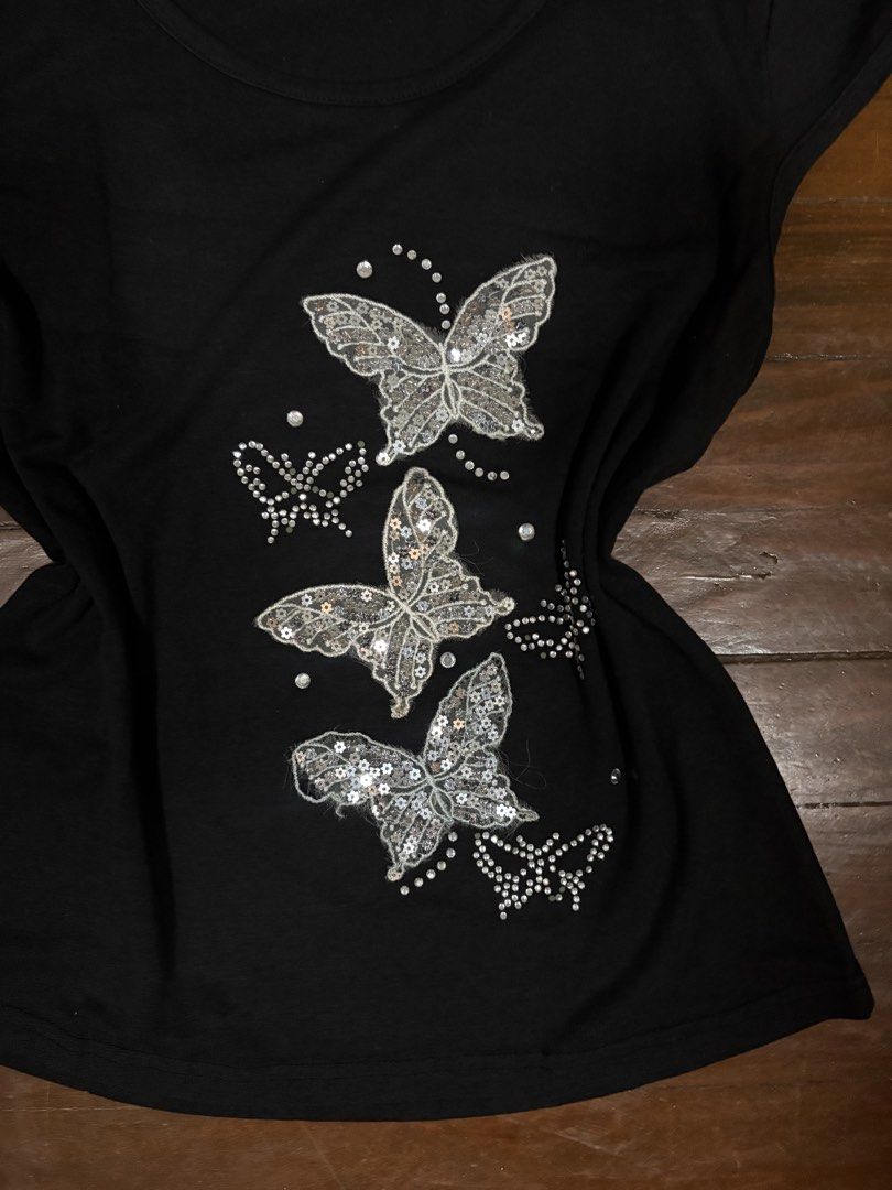 Dolce & Gabbana Butterfly Rhinestone Beaded Top (Category: Shirts) located in Manila. Submitted by da.rrel.real (Listing ID 1464691941, Image 3). Description: ⋆˚꩜｡ details ⋆˚꩜｡ size : l on tag best fits : best fits m-l issues : missing rhinestone color rate : 9/10 .✦ ݁˖ rules .✦ ݁˖ * no return / refund / exchange * you ask for more photos if you're SURE BUYER * shipping fee is shouldered by buyers unless stated otherwise (loc: Baguio City) love, 