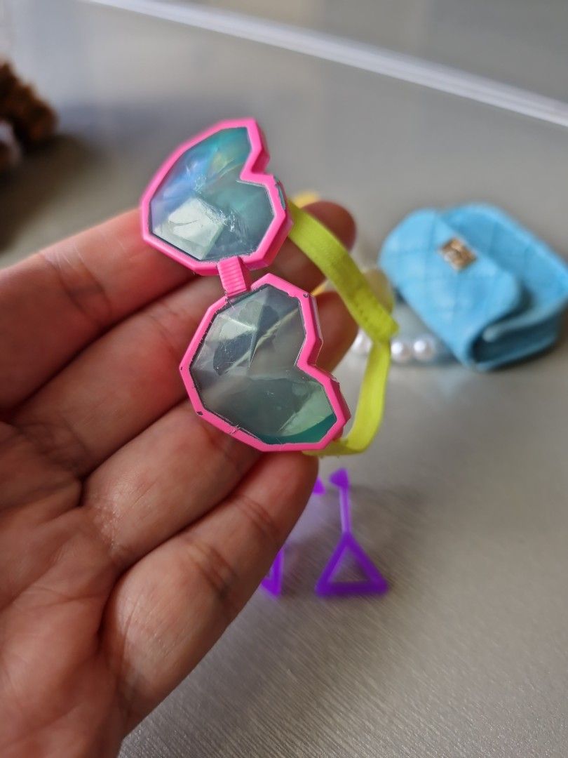 Doll Purse, Sunglasses, and Earrings Set (Category: Kids Toys) located in Quezon City. Submitted by declttermum (Listing ID 1464579817, Image 2). Description: LOL surprise OMG doll accessories bundle. Wysiwyg. Available by December. #lolsurpriseomgdoll #lolsurpriseomgdollaccessories #dollaccessories #lolsurprisedoll.