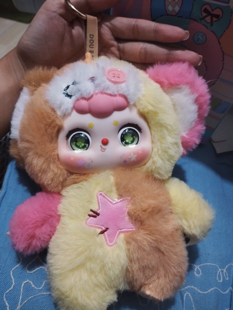 Doubao Y2K Party Series Opened | Little Monkey (Category: Designer & Blind Box Toys) located in Valenzuela. Submitted by carlywaters (Listing ID 1464689076, Image 3). Description: - Brand: Doubao (Y2K Party Series) - Character: Little Monkey - Condition: Opened (checked condition), like new with original box and sticker - Features: Soft plush material, pastel colorway (yellow, brown, pink), big shiny eyes (changeable, 3 kinds), and pink star bell