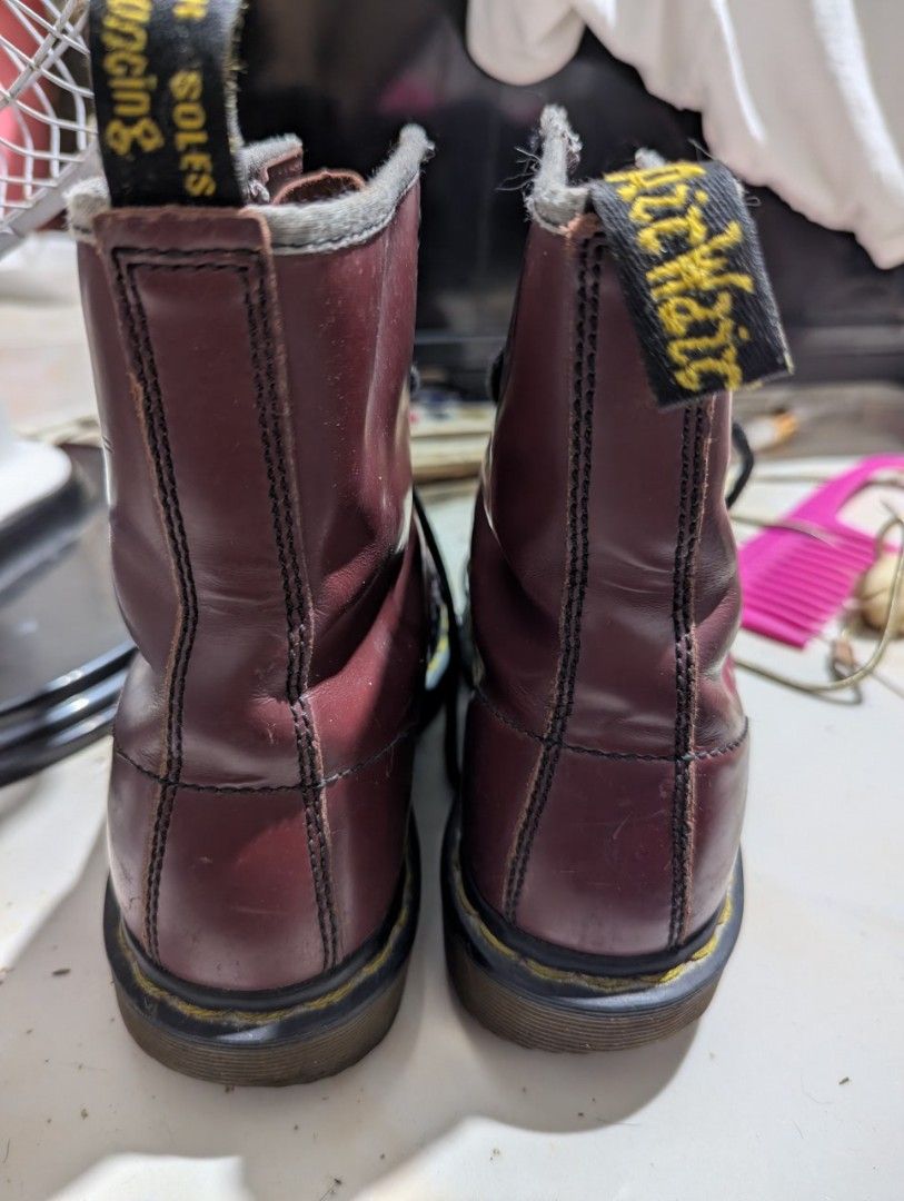 Dr. Martens 1460 Cherry Red Smooth Leather Boots (Category: Boots) located in Manila. Submitted by yonggagotthasauce (Listing ID 1464626251, Image 3). Description: - Classic Dr. Martens 1460 boots - Cherry red smooth leather - Air Cushion Soles for comfort - Iconic yellow stitching - Pre-owned with signs of wear (creasing, scuffs) for sale: dr martens 1460 8 eye boots size UK4 US5 condition 8/10 color maroon/cherry selling it for 1500 slightly ne
