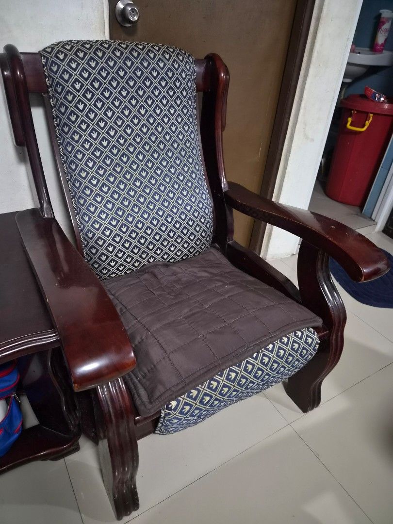 Dragon Sala Set_ Sofa Chair with Patterned Cushions (Category: Sofas) located in Caloocan City. Submitted by grandflower.2c6677 (Listing ID 1464669684, Image 2). Description: - Elegant wooden sofa chair with a dark, polished finish. - Features comfortable patterned seat and back cushions. - Includes a stylish quilted brown throw for added coziness. - Sturdy construction ensures durability. - Ideal for enhancing your living room or study space. RF
