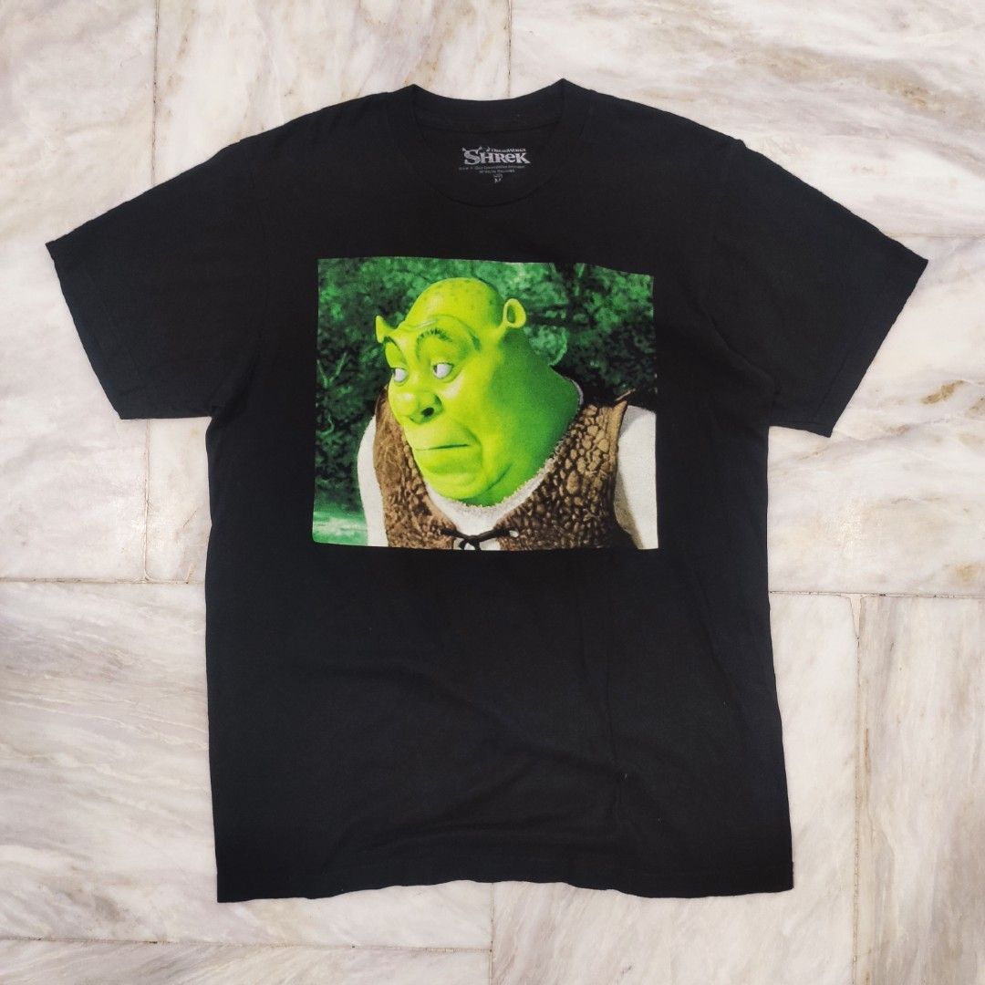 DreamWorks Shrek “Bored Meme” Official Merch (Category: Tshirts & Polo Shirts ) located in Manila. Submitted by godlesstime (Listing ID 1464614103, Image 1). Description: Size: Medium Measurements: 19 × 27 in Details: • Official DreamWorks merchandise • Silkscreen print • Color Rate: 9.8/10 • 6 pinholes — unnoticeable • Featuring Shrek’s iconic bored expression, widely used as a reaction meme Price: ₱500 + shipping fee DM for inquiries and to pur