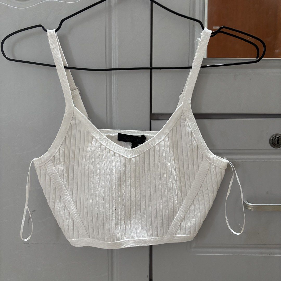 Dubai Knitted White Tank Top (Category: Sleeveless) located in Binan City. Submitted by mypreloved_haul (Listing ID 1464584557, Image 1). Description: LAST PRICE POSTED! FOR SURE BUYERS ONLY! .