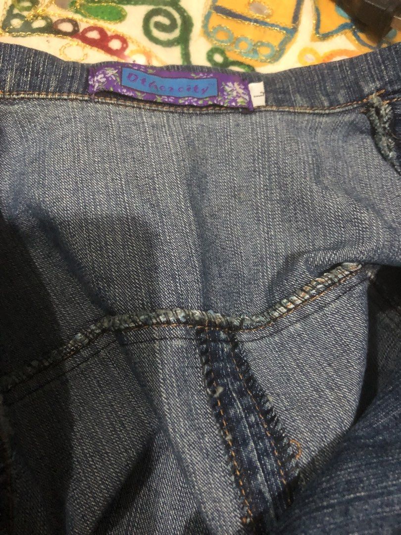D'zz'city Denim Vest with Embellished Button (Category: Sleeveless) located in Quezon City. Submitted by unique2shop (Listing ID 1464590827, Image 3). Description: - Brand: D'zz'city - Style: Denim Vest - Closure: Single embellished button - Versatile: Great for layering over tops - Fashionable: Adds an edgy touch to any outfit - Condition: Please check photos for detailed condition.