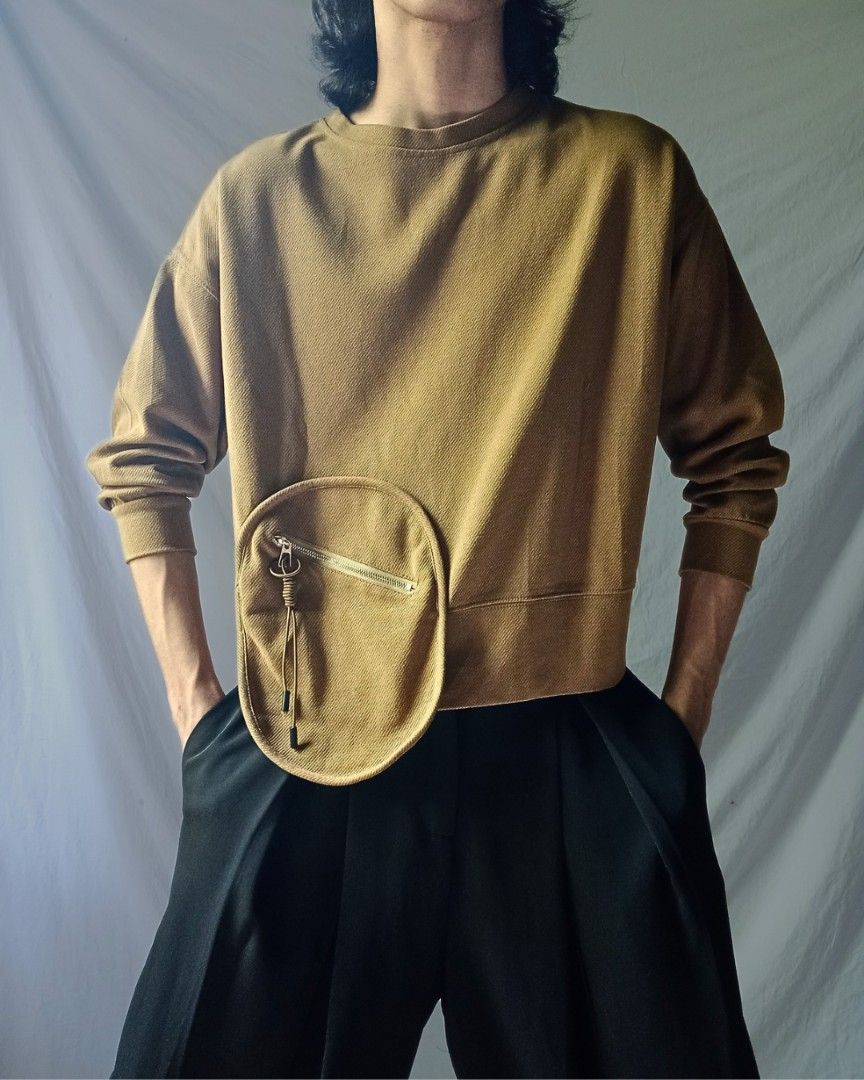 Earthy Mustard Unique Pocket Applique Top (Category: Others Tops) located in Cavite. Submitted by home_of_folds (Listing ID 1464710642, Image 2). Description: Earthy Unique Pocket Top This piece features this uniquely placed functional zipper closure pocket, mustard yellow-ish taupe earthy hue, comfy and quality fabric. Color looks better in person. Condition: Like New! Issue: None Measurements (inches): Shoulder: 23" Sleeves: 18" Width/Bust: 48"