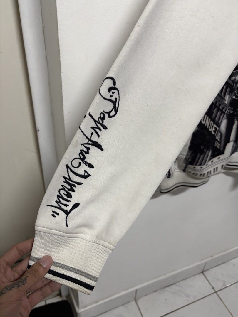 Ecko Unltd. Los Angeles Graffiti Full Zip Track Jacket (Category: Coats, Jackets and Outerwear) located in Manila. Submitted by skeletal_v2 (Listing ID 1464743676, Image 2). Description: ECKO UNLTD- AOP GRAFFITI WRITING ALL WRONGS 6500+SF 24/30 GOOD CONDITION COLOR RATE 9.2/10 STAIN Ecko Unltd. full zip track jacket. Cream base colour with striking Los Angeles graffiti print across the upper chest and monochrome street photography collage on the 