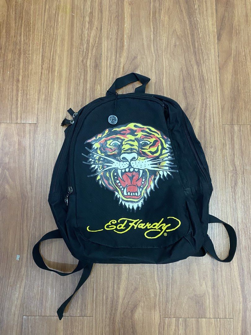 Ed hardy (Category: Backpacks) located in Manila. Submitted by johsua16 (Listing ID 1464585603, Image 1). Description: No major flaw Good condition 9.5/10 color rate Sariwa Loc: Davao city.
