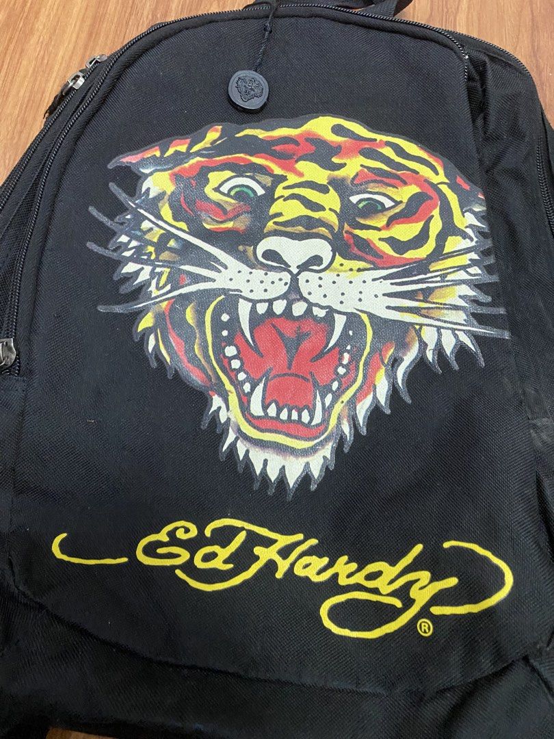 Ed hardy (Category: Backpacks) located in Manila. Submitted by johsua16 (Listing ID 1464585603, Image 2). Description: No major flaw Good condition 9.5/10 color rate Sariwa Loc: Davao city.