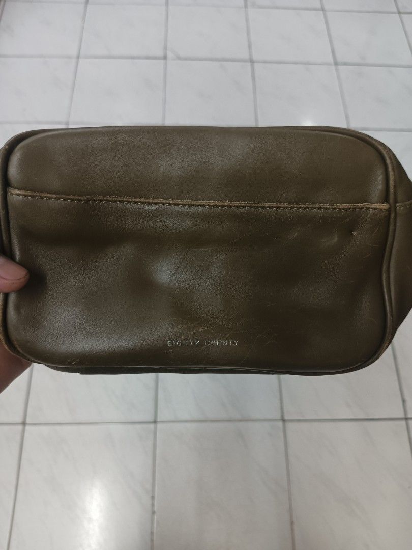 Eighty Twenty 80/20 Olive Green Leather Pouch Bag (Category: Luxury Bags & Wallets) located in Quezon City. Submitted by arvietekto (Listing ID 1464593221, Image 2). Description: Eigthy Twenty Genuine Leather sling bag - Olive green pouch bag from Eighty Twenty - Made of genuine leather - Measures 80/20 - Main zip compartment - Front pocket - Ideal for carrying essentials.