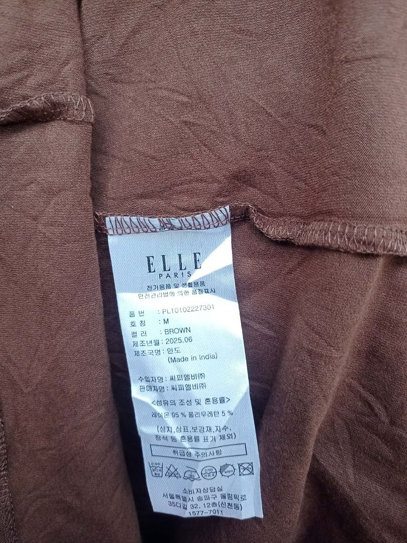 ELLE Paris choco brown turtle neck longsleeve (Category: Others Tops) located in Davao. Submitted by irisrazona16792 (Listing ID 1464585087, Image 3). Description: Medium on tag cotton Made in India Mall quality.