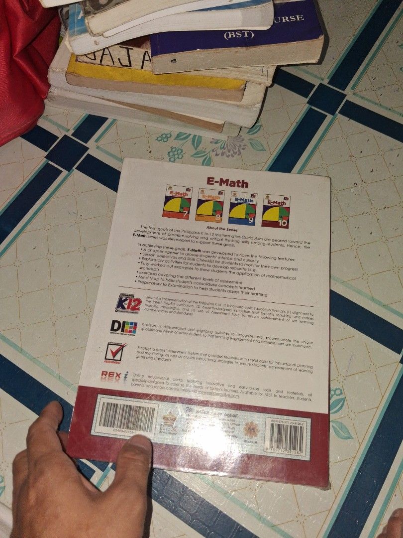 E-Math Worktext in Mathematics Grade 10 Revised Edition (Category: Textbooks) located in Manila. Submitted by marcas022798212 (Listing ID 1464616490, Image 3). Description: - E-Math Worktext in Mathematics for Grade 10 - Revised Edition - Published by REX Book Store - Authors: Orlando A. Cronce & Marilyn O. Mendoza - Key Topics: Patterns and Algebra, Polynomial Functions, Circles - Perfect for students seeking a thorough math resource.