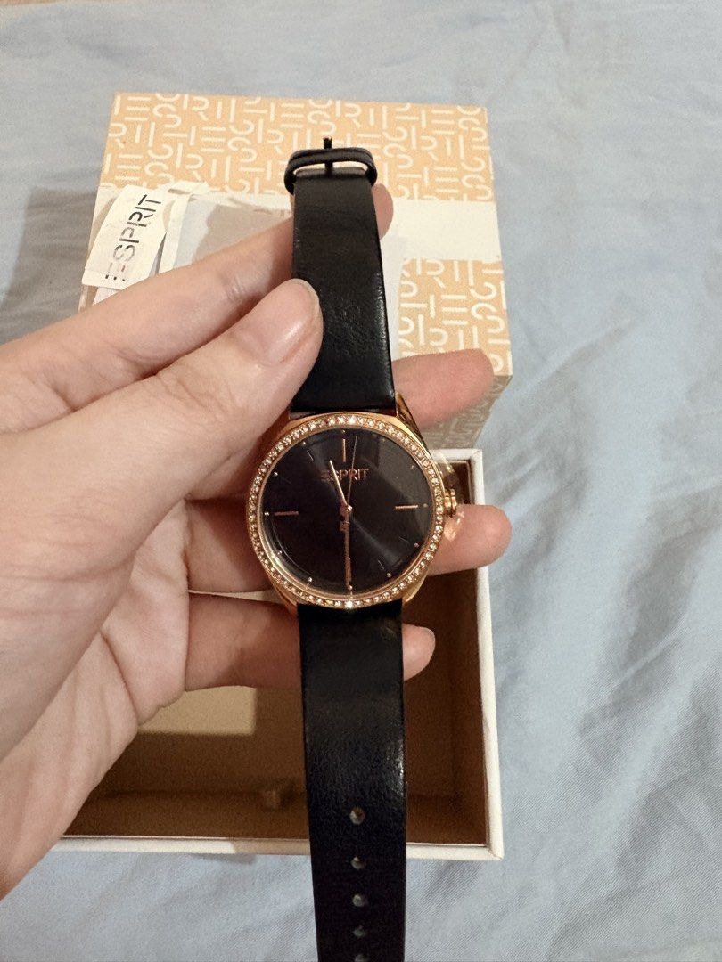Esprit Watch Rose Gold Black Leather Strap (Category: Women's Watches) located in Tanza. Submitted by abi_blanca (Listing ID 1464593807, Image 3). Description: - Esprit watch with elegant rose gold case - Comfortable black leather strap - Stylish black dial adorned with crystal accents on the bezel - Water resistant up to 50 meters - Model number: 1L289 - Comes with original box and guarantee card - Perfect for both casual and formal occasions.