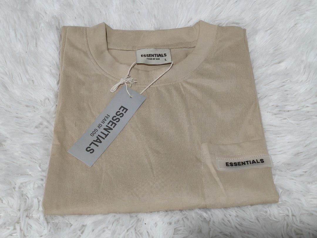 Essentials Menshirt/ Large (Category: Tshirts & Polo Shirts ) located in Makati City. Submitted by la_storeph (Listing ID 1464646968, Image 1). Description: - Essentials Menshirt Oversize - Color: Beige -Size Large - Material: Corduroy - Features a chest pocket with the Essentials logo - Size: Large (L) .