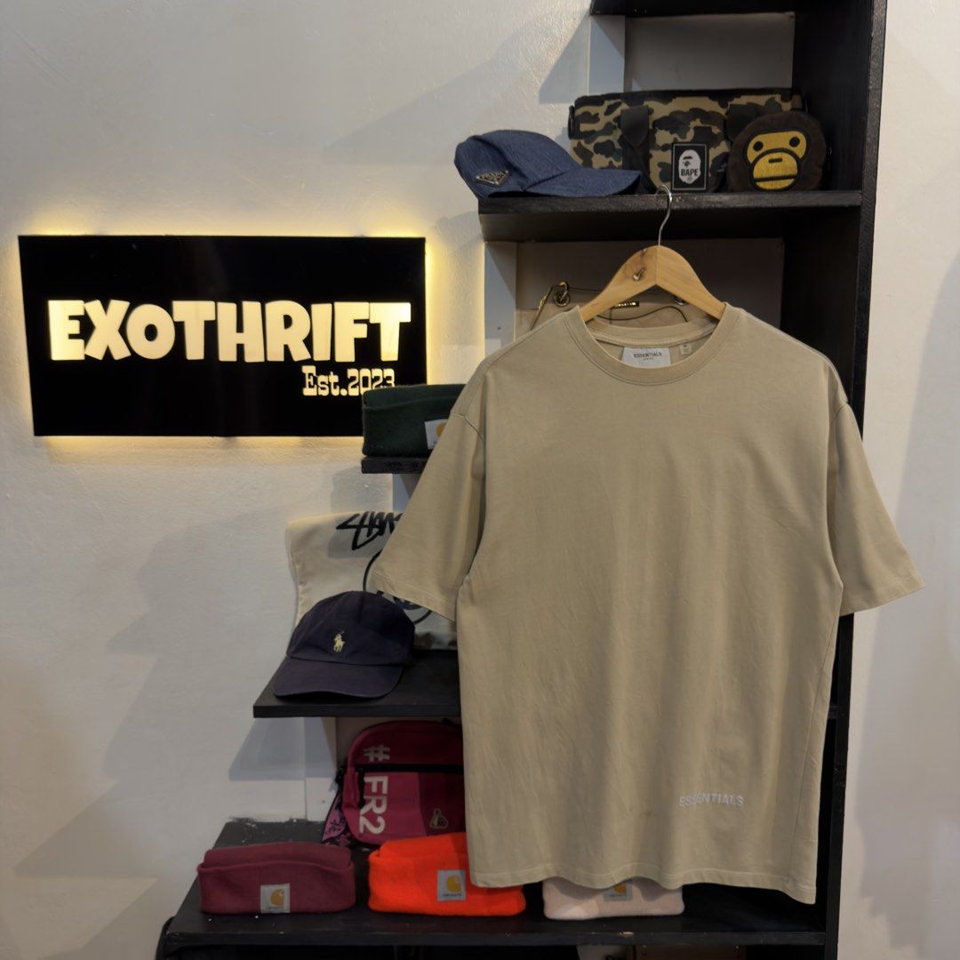 Essentials Reflectorize Khaki Shirt (Category: Tshirts & Polo Shirts ) located in Manila. Submitted by jerichomal82553 (Listing ID 1464745469, Image 2). Description: Essentials Reflectorize Khaki Shirt 20 by 29 Good Condition Complete Tags .