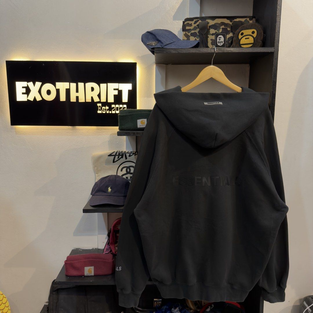 Essentials Zip Up Triple Black Hoodie (Category: Hoodies) located in Manila. Submitted by jerichomal82553 (Listing ID 1464751583, Image 2). Description: Essentials Zip Up Triple Black Hoodie 28 by 31 Good Condition Complete Tags CLAIM 2k.