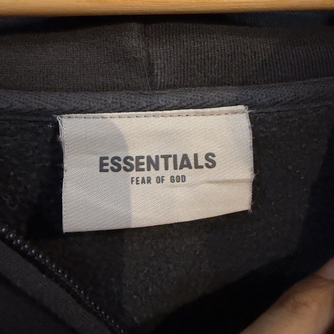 Essentials Zip Up Triple Black Hoodie (Category: Hoodies) located in Manila. Submitted by jerichomal82553 (Listing ID 1464751583, Image 3). Description: Essentials Zip Up Triple Black Hoodie 28 by 31 Good Condition Complete Tags CLAIM 2k.