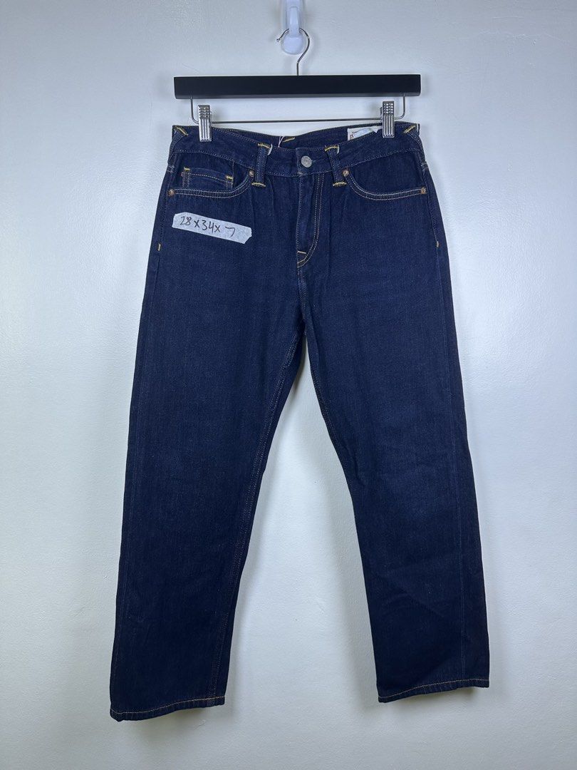 EVISU 91 Custom Made Jeans with Patches (Category: Jeans) located in Manila. Submitted by declutterpromax (Listing ID 1464617269, Image 1). Description: - Dark wash Evisu jeans - Iconic Evisu logo patches all over - Button fly closure - Leather patch on the back - Size: 28x34 - A great statement piece.