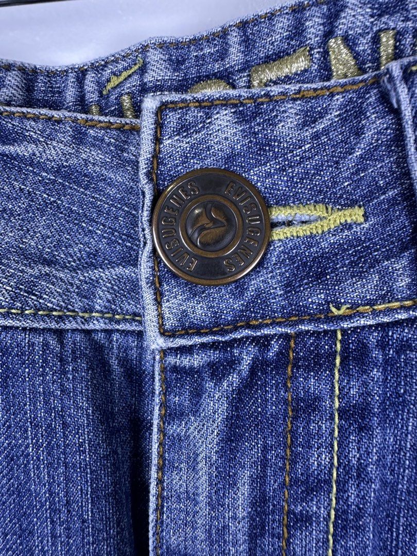 Evisu Genes Denim Shorts (Category: Shorts) located in Manila. Submitted by declutterpromax (Listing ID 1464617994, Image 2). Description: - Brand: Evisu Genes - Type: Blue Denim Shorts - Style: Distressed with frayed hem - Features: Classic Evisu stitching on back pockets, button fly closure - Occasion: Great for casual wear.