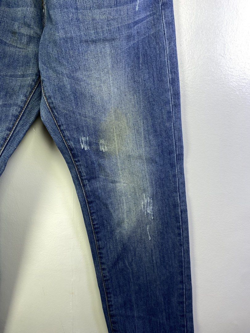 Evisu Jeans 13oz Denim Distressed Blue (Category: Jeans) located in Manila. Submitted by declutterpromax (Listing ID 1464601129, Image 3). Description: - Classic Evisu Jeans - Size: 34x32 - Material: 13oz Denim - Wash: Distressed Blue - Features: Iconic Evisu logo on back pockets, button fly closure, frayed hem detail.