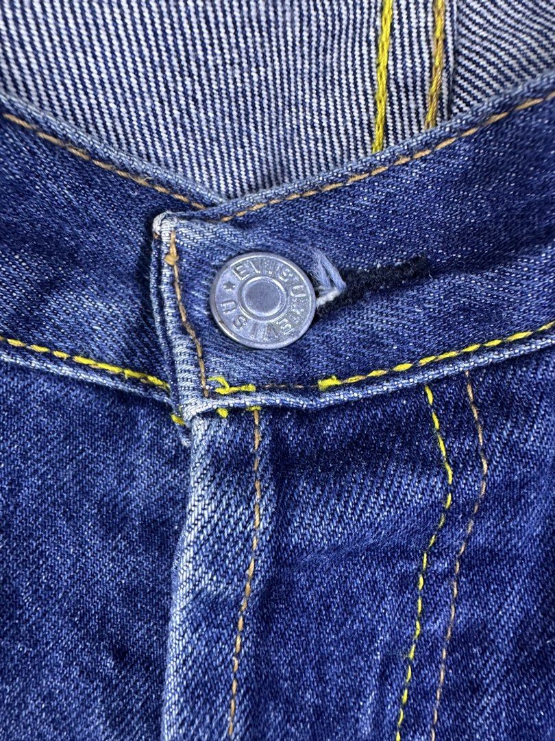 EVISU Jeans Blue Denim Button Fly Seagull Logo (Category: Jeans) located in Manila. Submitted by declutterpromax (Listing ID 1464619296, Image 2). Description: - Brand: Evisu - Style: Classic Blue Denim Jeans - Size: 36x32 - Features: Iconic white seagull logo on back pockets - Closure: Button fly - Condition: Good, ready for a new owner.