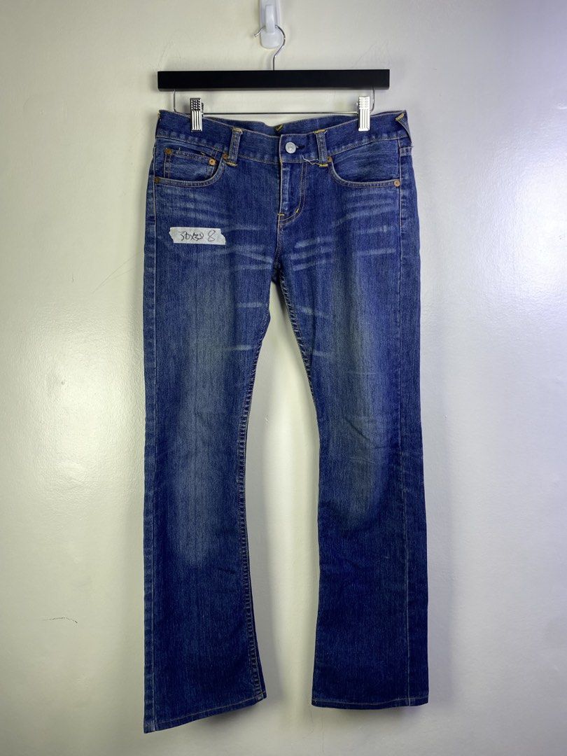 Evisu Jeans Blue Denim M Logo (Category: Jeans) located in Manila. Submitted by declutterpromax (Listing ID 1464601136, Image 1). Description: - Brand: Evisu - Type: Blue Denim Jeans - Fit: Classic Straight Leg - Signature Detail: Iconic M logo on back pockets - Condition: Good, with some signs of wear - Style: Perfect for casual wear.