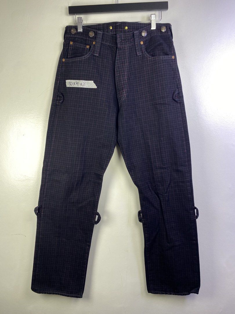 Evisu Pants Brand Jeans Size 30x31 Dark Patterned (Category: Jeans) located in Manila. Submitted by declutterpromax (Listing ID 1464601134, Image 1). Description: - Unique dark patterned jeans with a houndstooth-like design - Button fly closure - Gold-tone hardware details - Adjustable straps at the ankle - Leather brand patch on the back - Size: 30x31 - Ideal for casual or streetwear outfits.