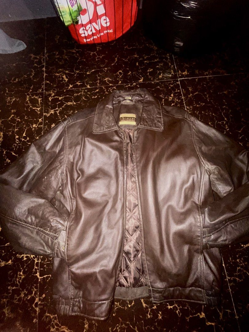 EXCELLED VINTAGE OUTERWEAR PIECE (Category: Coats, Jackets and Outerwear) located in Manila. Submitted by preloved_quality216 (Listing ID 1464677044, Image 1). Description: - Classic brown leather jacket - Zip-up front closure - Quilted lining for warmth - Two interior pockets - Button closure on cuffs - Ideal for cooler weather - Versatile styling with jeans or trousers.