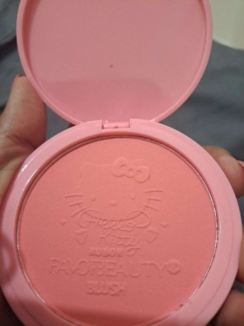 FavorBeauty Hello Kitty Limited Edition Blushes (Category: Makeup) located in Pasig City. Submitted by declotha (Listing ID 1464741074, Image 2). Description: For Sale: Limited edition Hello Kitty blushes from an international makeup brand, FavorBeauty. Original price per blush is 150 MXN or 525 PHP. Shades: 01, 02, 03 and 04. Swatched only to check how pigmented they are. They are very pigmented and smell like baby powder. Perfect for casual or 