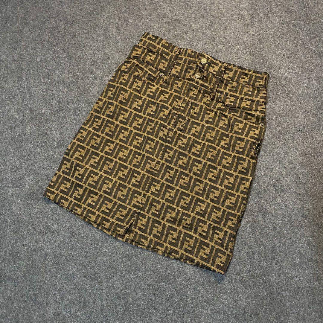 Fendi Jeans FF Monogram Mini Skirt (Category: Skirts) located in Cebu City. Submitted by callmejasonx (Listing ID 1464656350, Image 1). Description: - Classic Fendi Jeans mini skirt - Iconic all-over FF monogram pattern - Made in Italy by Ittierre S.p.A. - Comfortable cotton blend with spandex - Button closure at the waist - Perfect statement piece for fashion enthusiasts -Waist 28 -Lenght 19 -Hem 18 -Issue:See Last pic.