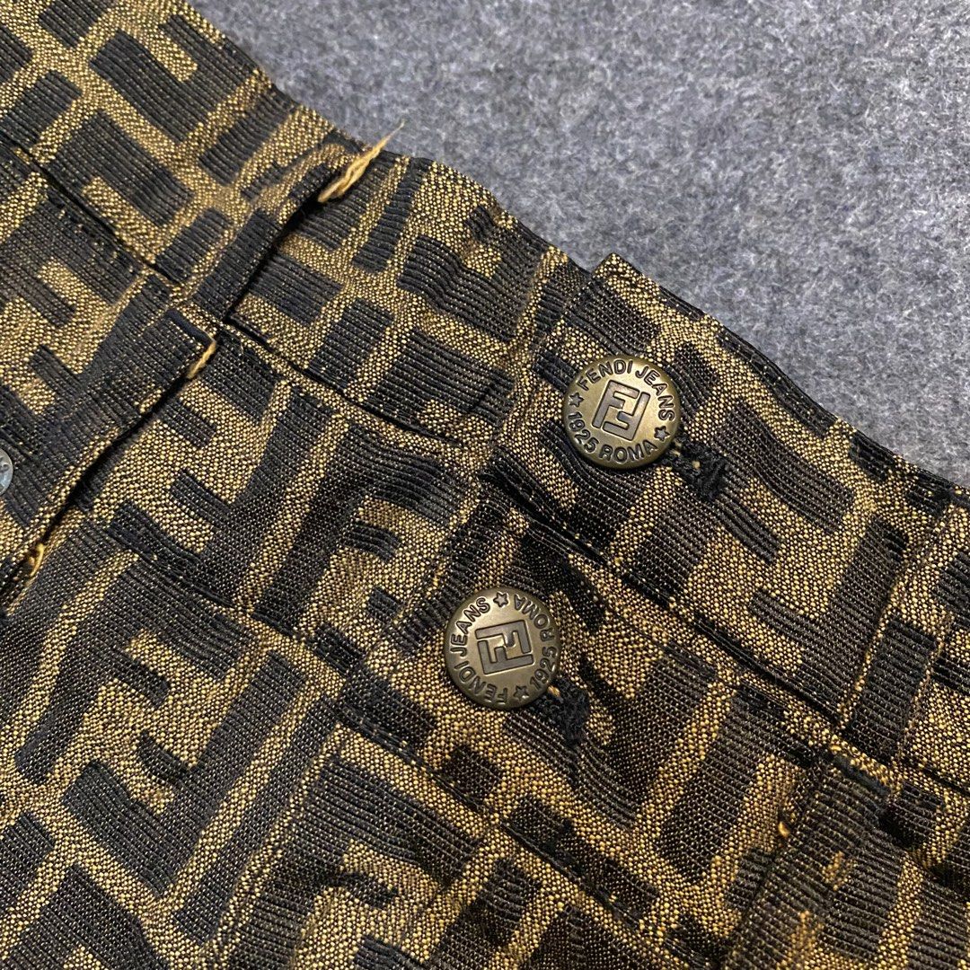 Fendi Jeans FF Monogram Mini Skirt (Category: Skirts) located in Cebu City. Submitted by callmejasonx (Listing ID 1464656350, Image 2). Description: - Classic Fendi Jeans mini skirt - Iconic all-over FF monogram pattern - Made in Italy by Ittierre S.p.A. - Comfortable cotton blend with spandex - Button closure at the waist - Perfect statement piece for fashion enthusiasts -Waist 28 -Lenght 19 -Hem 18 -Issue:See Last pic.