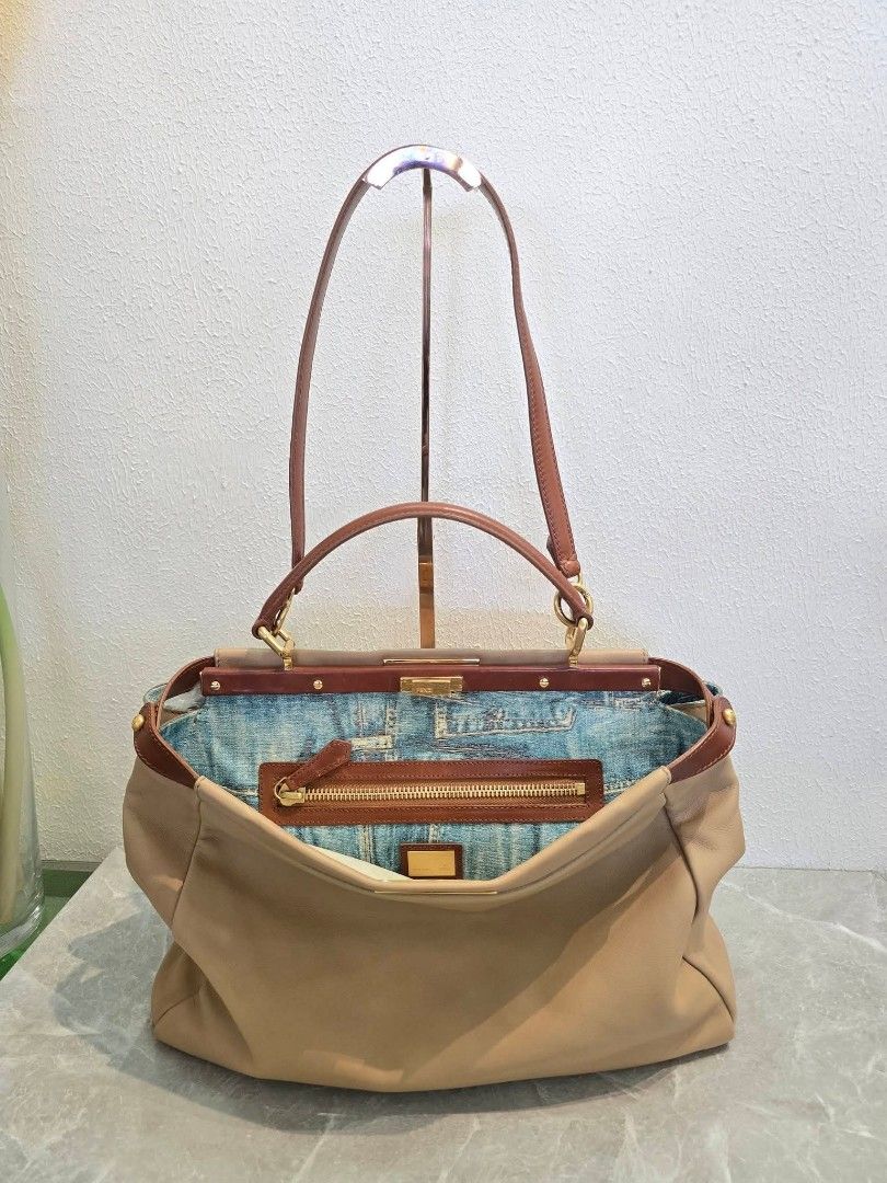 Fendi Peekabo (Category: Shoulder Bags) located in Manila. Submitted by ej.collections (Listing ID 1464633372, Image 2). Description: NEGOTIABLE PRICE ALL ITEMS ARE ONHAND 💯 GUARANTEED AUTHENTIC MONEY BACK IF PROVEN FAKE •Size: Large •Condition: Excellent •Inclusion: With original dustbag •Plus shipping fee •Local & international shipment 📍Loc. Davao City.