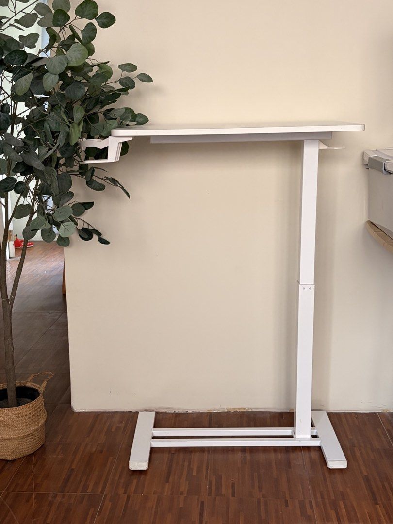 FlexiSpot Standing Desk with Cup Holder (Category: Tables & Sets) located in Cavite. Submitted by hellocari (Listing ID 1464648973, Image 2). Description: - Adjustable height standing desk - Built-in cup holder - Sturdy and stable base - Easy to move around - Perfect for home office or study spaces.