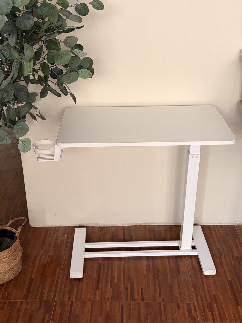 FlexiSpot Standing Desk with Cup Holder (Category: Tables & Sets) located in Cavite. Submitted by hellocari (Listing ID 1464648973, Image 3). Description: - Adjustable height standing desk - Built-in cup holder - Sturdy and stable base - Easy to move around - Perfect for home office or study spaces.