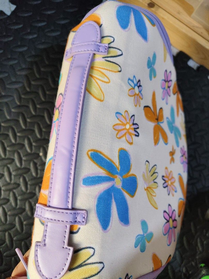 Floral Cosmetic Bag with Multiple Compartments (Category: Purses & Pouches) located in Quezon City. Submitted by zs.onlinehub (Listing ID 1464671908, Image 2). Description: Cute floral cosmetic bag with handle. Features multiple zippered and mesh pockets for organization. Ideal for travel or daily use. Zipper closure..