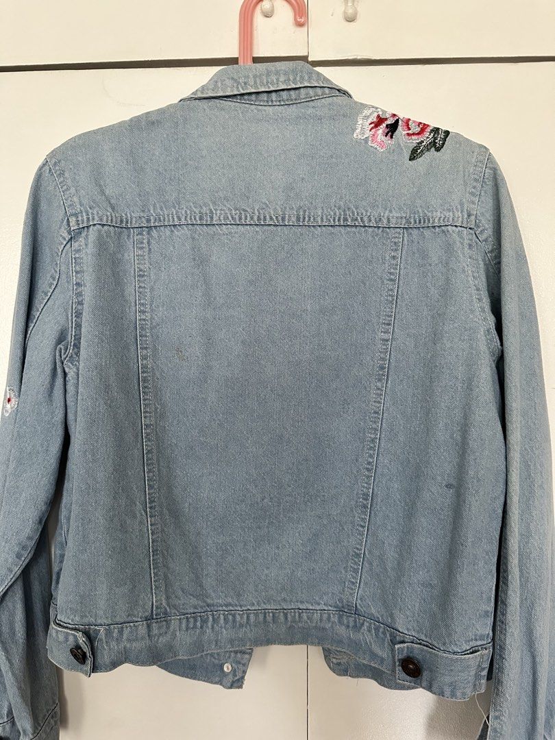Floral Denim Jacket (Category: Coats, Jackets and Outerwear) located in Paranaque City. Submitted by preloveeed890 (Listing ID 1464612906, Image 3). Description: has minor stain at the back as seen in the last photo | fits small (oversized) to large.