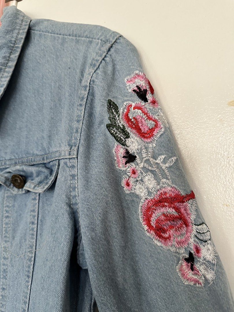 Floral Denim Jacket (Category: Coats, Jackets and Outerwear) located in Paranaque City. Submitted by preloveeed890 (Listing ID 1464612906, Image 2). Description: has minor stain at the back as seen in the last photo | fits small (oversized) to large.
