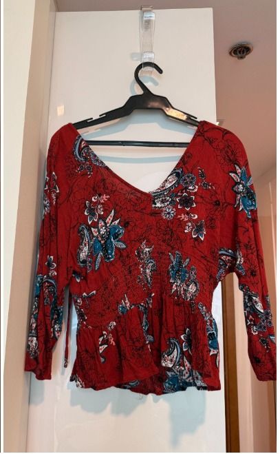 Dark Romantic Floral Smocked flared ruffle / Top (Boho Chic - S to M) (Category: Blouses) located in Makati City. Submitted by fpled (Listing ID 1459993240, Image 1). Description: 🌹 DARK ROMANTIC FLORAL FLARED RIFFLE 🌹 (US Boutique • Small to Medium • Dark Feminine / Boho Chic) Dark romantic blouse from US boutique brand Gypsies & Moondust (sold at PacSun)! Features a rich deep wine red base with intricate blue, white, and paisley floral accent
