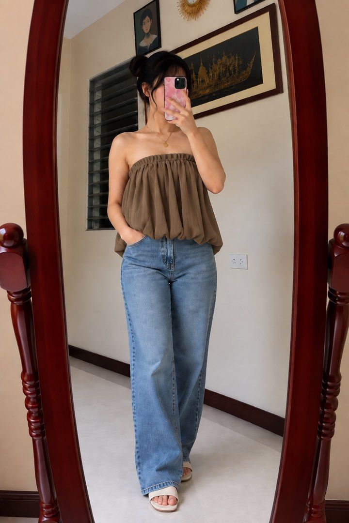 Flowy Tube Top - Brown - Stretchy (Category: Sleeveless) located in Baguio. Submitted by surplusbaguio.shop (Listing ID 1464620902, Image 2). Description: - Super cute and flowy tube top - Comfortable elasticated neckline - Lightweight fabric with a lovely drape - Versatile brown color - Perfect for casual outings or dressing up - Pairs well with jeans or skirts.