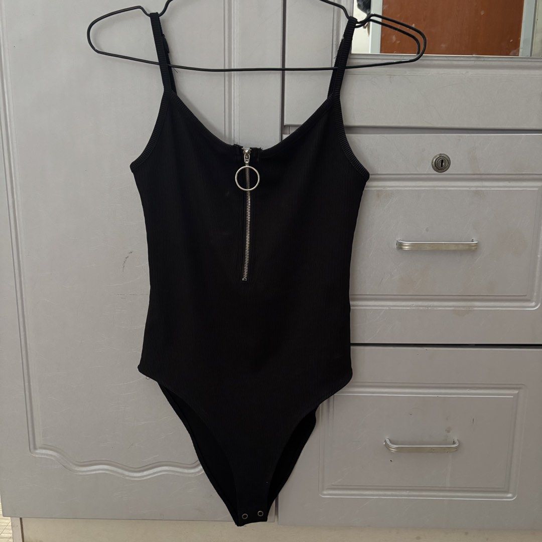Forever21 Black Zipup Bodysuit (Category: Sleeveless) located in Binan City. Submitted by mypreloved_haul (Listing ID 1464630032, Image 1). Description: LAST PRICE POSTED! FOR SURE BUYERS ONLY.