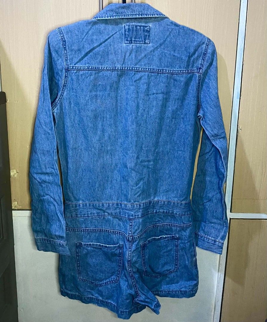Forever 21 Denim Romper (Category: Rompers) located in Las Pinas. Submitted by modemnl (Listing ID 1464737958, Image 2). Description: Size: Small | Color: Denim Blue Cute and stylish F21 denim romper featuring long sleeves and shorts for a fun, effortless look. Perfect for casual days, weekend outings, vacations, or everyday wear. -One-piece romper design -Easy to style with sneakers, sandals, or boots -Perfect for casual and weekend looks.