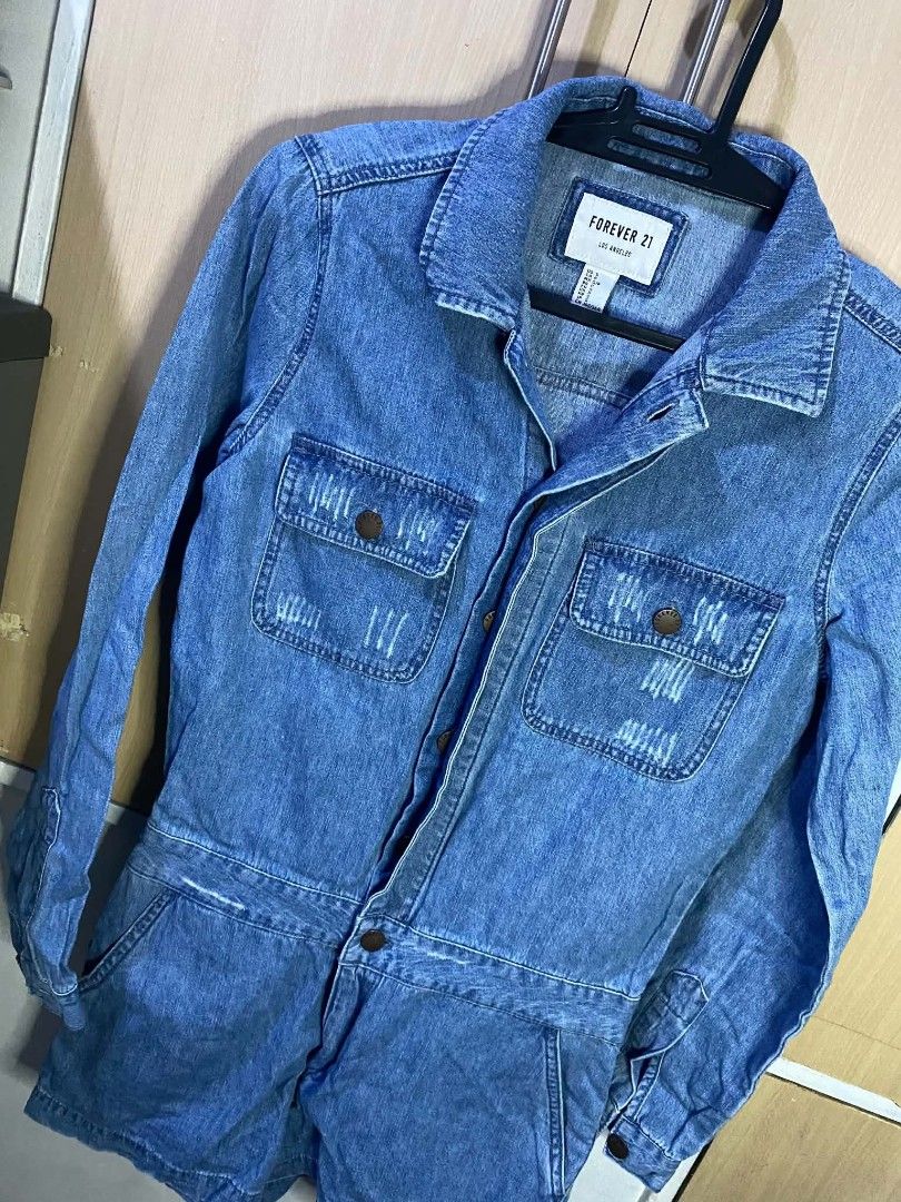 Forever 21 Denim Romper (Category: Rompers) located in Las Pinas. Submitted by modemnl (Listing ID 1464737958, Image 3). Description: Size: Small | Color: Denim Blue Cute and stylish F21 denim romper featuring long sleeves and shorts for a fun, effortless look. Perfect for casual days, weekend outings, vacations, or everyday wear. -One-piece romper design -Easy to style with sneakers, sandals, or boots -Perfect for casual and weekend looks.