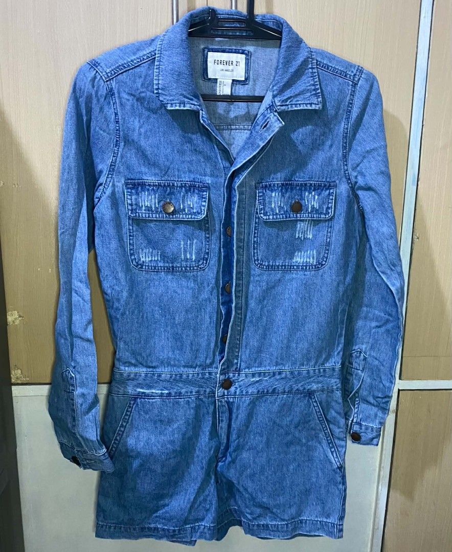 Forever 21 Denim Romper (Category: Rompers) located in Las Pinas. Submitted by modemnl (Listing ID 1464737958, Image 1). Description: Size: Small | Color: Denim Blue Cute and stylish F21 denim romper featuring long sleeves and shorts for a fun, effortless look. Perfect for casual days, weekend outings, vacations, or everyday wear. -One-piece romper design -Easy to style with sneakers, sandals, or boots -Perfect for casual and weekend looks.