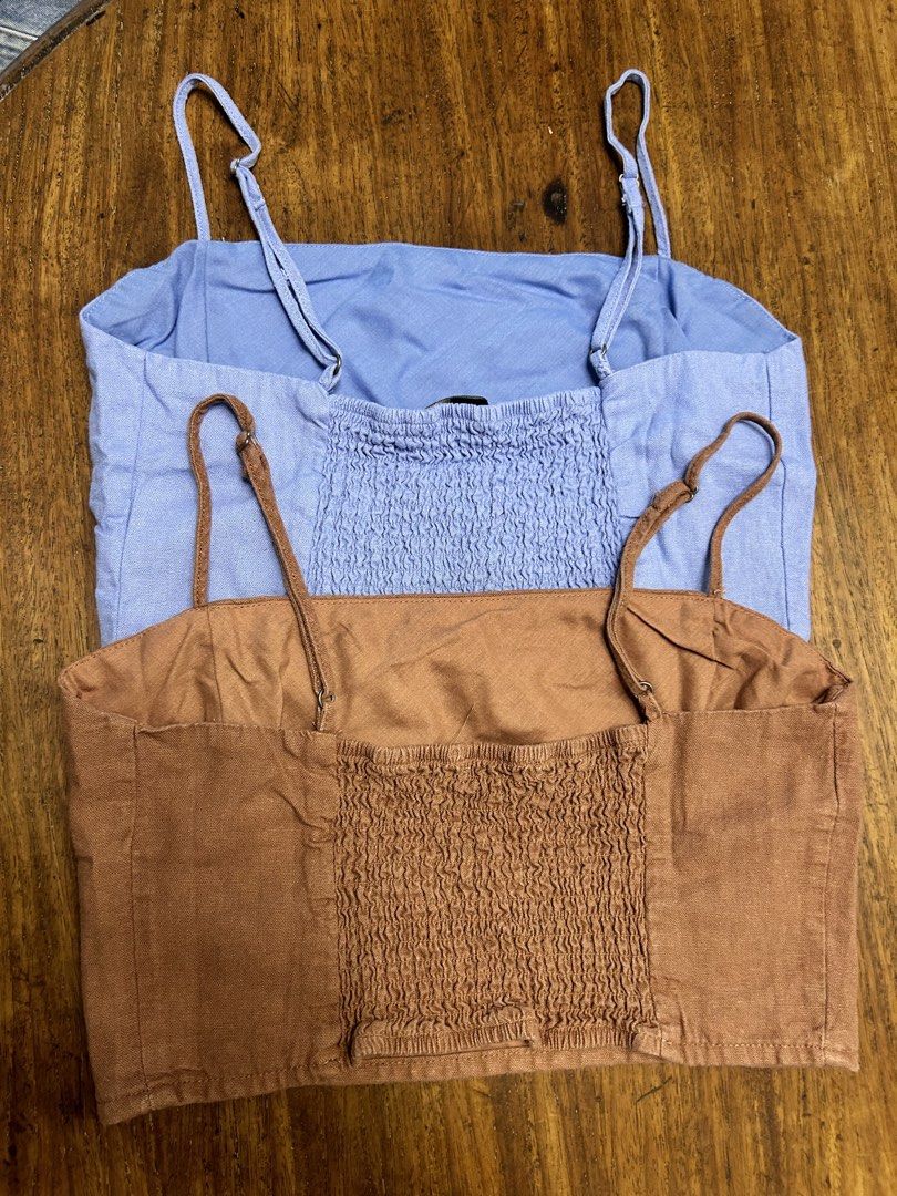 Forever 21 Linen Cami Crop Top Bundle (Category: Others Tops) located in Antipolo. Submitted by tshopph (Listing ID 1464600598, Image 2). Description: ☀️ Linen Blend Cropped Cami Tops ☀️ Breezy, lightweight crop tops featuring a straight neckline and a flexible smocked back. Perfect for casual summer wear, beach trips, or layering with high-waisted shorts and skirts. ✨ Colors available: blue & brown ✨ Style: cropped linen cami top ✨ Clean straigh