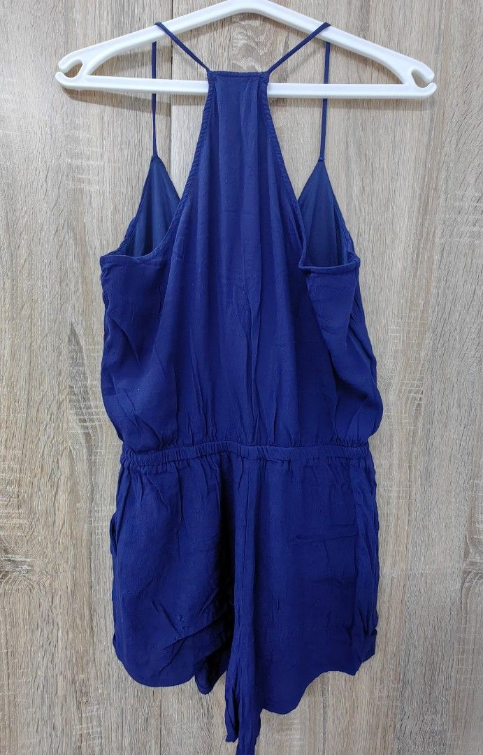 Forever 21 Royal Blue Spaghetti Strap Romper (Category: Rompers) located in Las Pinas. Submitted by offtonewhome (Listing ID 1464612519, Image 2). Description: - Royal blue romper from Forever 21 - Features spaghetti straps and a flattering halter neck - Elasticated waist for a comfortable fit - Convenient side pockets - Lightweight fabric, ideal for warm weather - Versatile for dressing up or down.