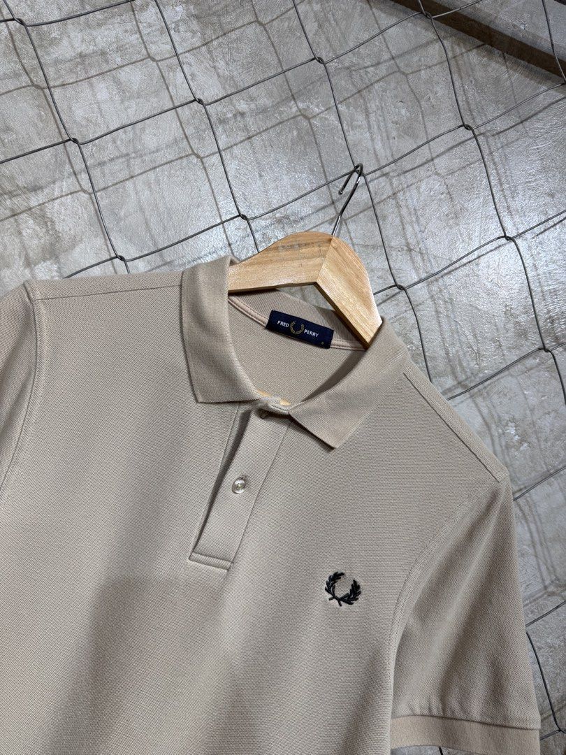 Fred Perry Beige Polo Shirt Size S (Category: Tshirts & Polo Shirts ) located in Manila. Submitted by ardobe.mnl (Listing ID 1464747794, Image 2). Description: Fred Perry Beige Poloshirt. Size: Small Dimes: 17.5x26 Condition: Excellent Flaw: None! Dm for inquiries!.