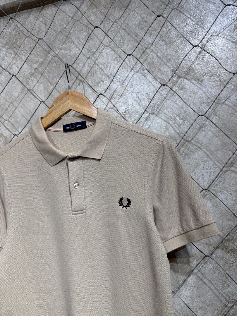 Fred Perry Beige Polo Shirt Size S (Category: Tshirts & Polo Shirts ) located in Manila. Submitted by ardobe.mnl (Listing ID 1464747794, Image 3). Description: Fred Perry Beige Poloshirt. Size: Small Dimes: 17.5x26 Condition: Excellent Flaw: None! Dm for inquiries!.