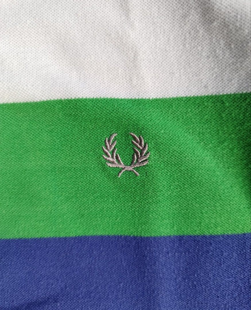 Fred Perry Relaxed Striped Polo shirt (Category: Tshirts & Polo Shirts ) located in Muntinlupa City. Submitted by lokalthriftco. (Listing ID 1464589844, Image 2). Description: Size M Minimal Lints, Pinholes, Stains Need wash Good condition.