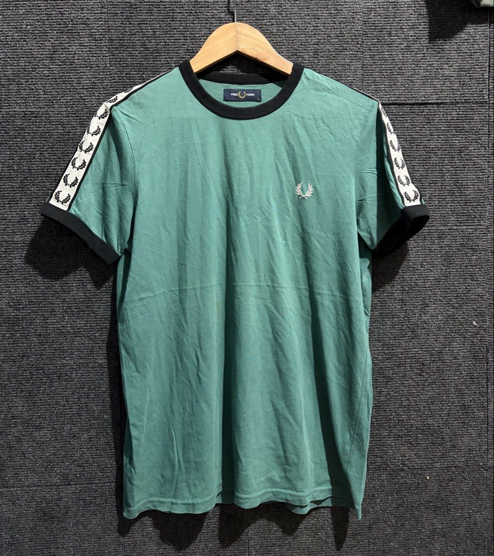 Fred perry side tape (Category: Activewear) located in Baguio. Submitted by picksby_mik (Listing ID 1464755575, Image 1). Description: Very good condition S on tag.